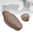 2023 Honda Cross Cub CC110 Substitua o copo do motorista frontal e traseiro em Braun