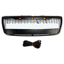 Ford Explorer (2012–2015) mit grauem Frontstoßstangengrill (oben)