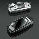 Schwarze Autoschlüsselhülle aus Aluminiumlegierung mit TPU-Verschluss und Schnalle für Audi A6L, A4L und A3
