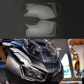 Framljusglasskydd, lämplig för Honda Adv 150 2019-2020 Smoke Generic